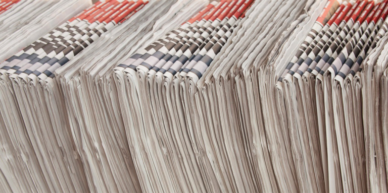 Newspapers Stacked
